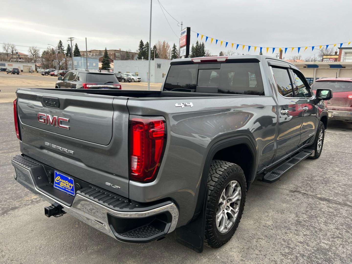 2021 Blue /Blue GMC Sierra 1500 SLT (3GTU9DED7MG) with an 5.3L V8 engine, automatic transmission, located at 116 5th Avenue South, Lewistown, MT, 59457, 47.063877, -109.427879 - Unleash the Power of the Roads with Our Pre-Owned 2021 GMC Sierra 1500 Crew Cab 4WD! Experience the thrill of the open road in this stunning GMC Sierra 1500, a beast on wheels that's ready to conquer any terrain! Don't miss your chance to own this powerful machine - now available in our pre-owned - Photo#2